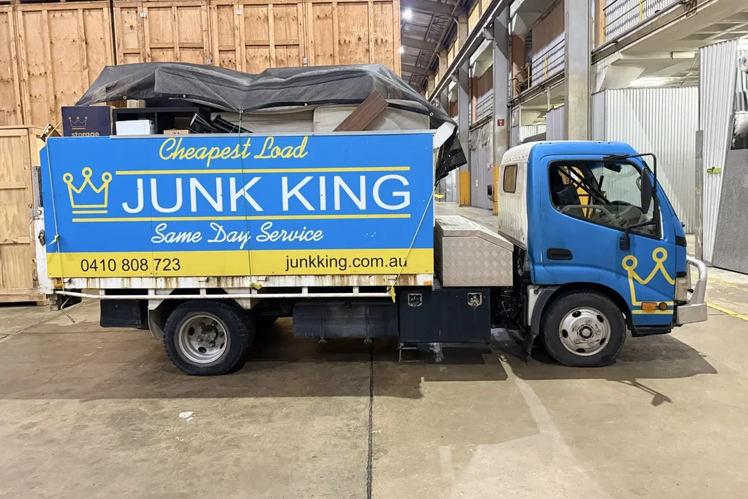 Loaded Junk King truck inside a storage facility